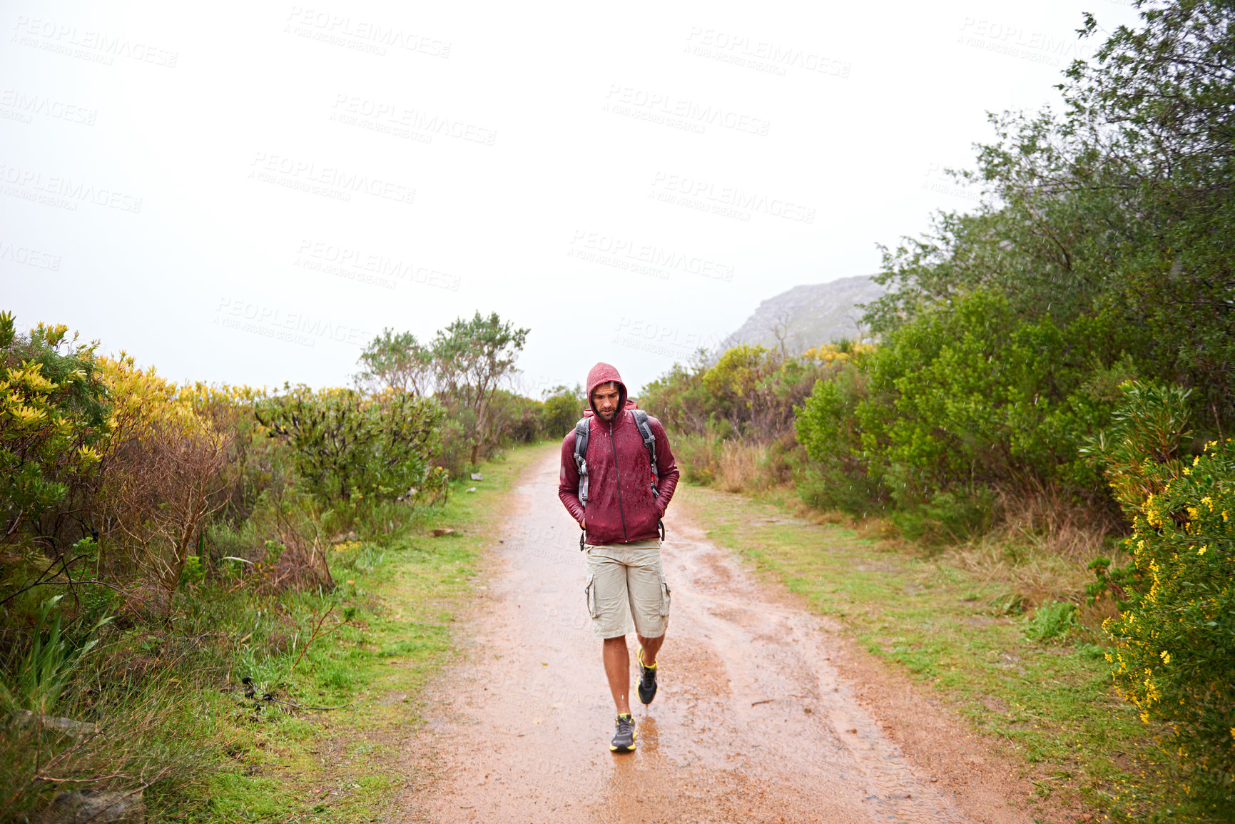 Buy stock photo Hiking, man and walking in nature for travel, backpack and outdoor for fresh air and fitness on path for trip. Trekking, mountain trail and terrain for adventure, journey and exercise in environment