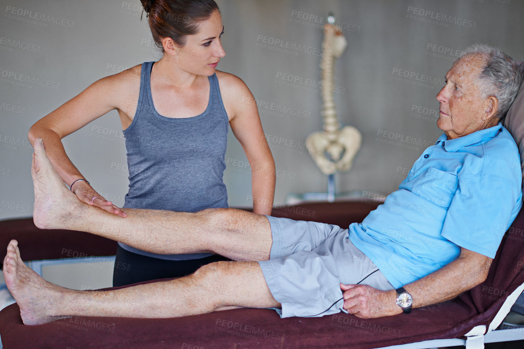 Buy stock photo Shot of an elderly man having a physiotherapy session