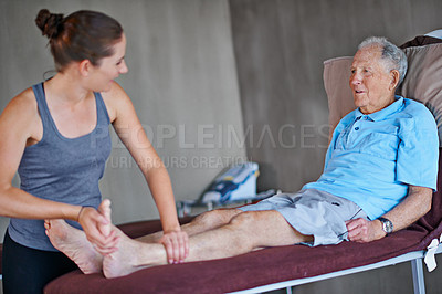 Buy stock photo Woman, chiropractor and senior patient with joint pain in elderly care for muscle or leg injury at clinic. Female person or physiotherapist helping man for consultation, arthritis or ache at hospital