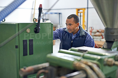 Buy stock photo Engineer, factory and machine with warehouse, work and manufacturing industry maintenance. Professional man, tradesman and system with equipment, repair and technology with contractor career or job