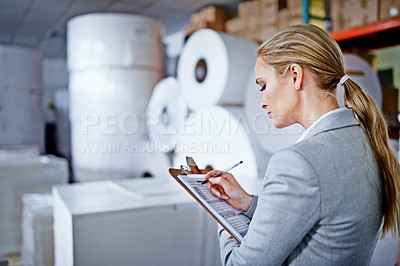 Buy stock photo Warehouse, business and woman with clipboard, writing and  working as employee in corporate company. Supplier, staff and female person with checklist, inventory and logistics for packaging in store