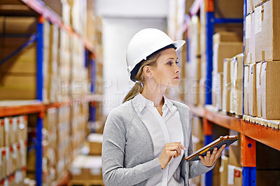 Buy stock photo Woman, tablet and taking inventory in logistics warehouse for package distribution, delivery and stock. Female inspector person, digital device and hard hat in commercial shipping industry. 