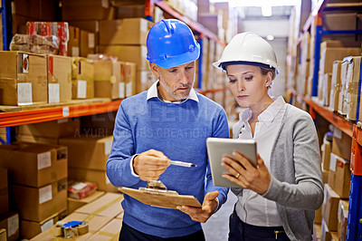 Buy stock photo Warehouse, man and woman with tablet, teamwork and inspecting inventory with cooperation. Large distribution, supervisor and management with technology and update schedule with app and industrial