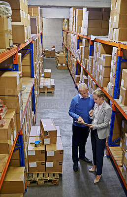 Buy stock photo Clipboard, logistics and business people at warehouse with top view planning, teamwork or delivery checklist. Retail, sales or factory team brainstorming compliance, documents or storage solution