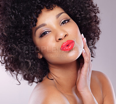 Buy stock photo Kiss, beauty and portrait of black woman with makeup, afro and skincare with confidence in studio. Dermatology, facial cosmetics and happy model girl with red lipstick isolated on white background