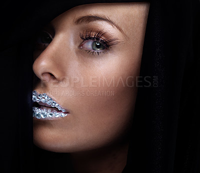Buy stock photo Beauty, portrait and woman with crystal on lips in studio with jewelry on skin isolated on a black background. Diamond, face and serious model with creative makeup for fashion, cosmetics or eyelashes