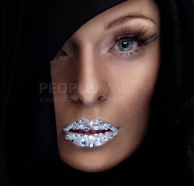 Buy stock photo Skin, portrait and woman with crystal on lips in studio with jewelry for fashion isolated on a black background. Diamond, face or serious model with creative makeup for beauty, cosmetics or eyelashes