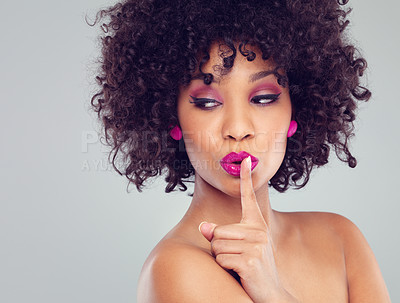 Buy stock photo Studio, secret and finger for female person, beauty or makeup isolated on white background. Lipstick, cosmetic or gesture for quiet with afro woman model, cosmetology or skincare or natural aesthetic