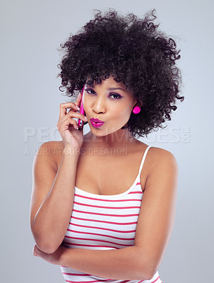 Buy stock photo Black woman, cellphone for phone call and communication, kiss in portrait and lipstick on white background. Contact, chat and tech with afro hairstyle and pink makeup, app and connection with pout