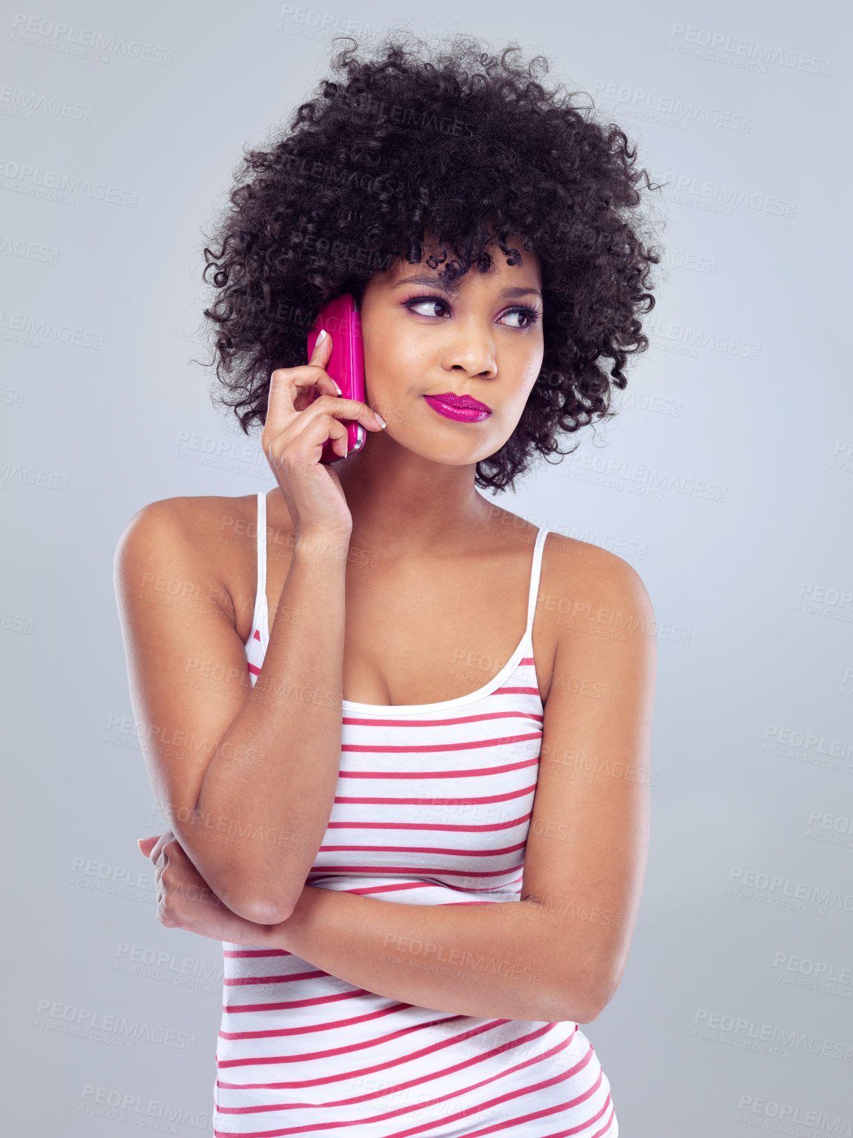 Buy stock photo Black woman, cellphone for phone call and communication with listening and lipstick on white background. Contact, chat and technology with afro hairstyle and pink makeup, app and connection in studio