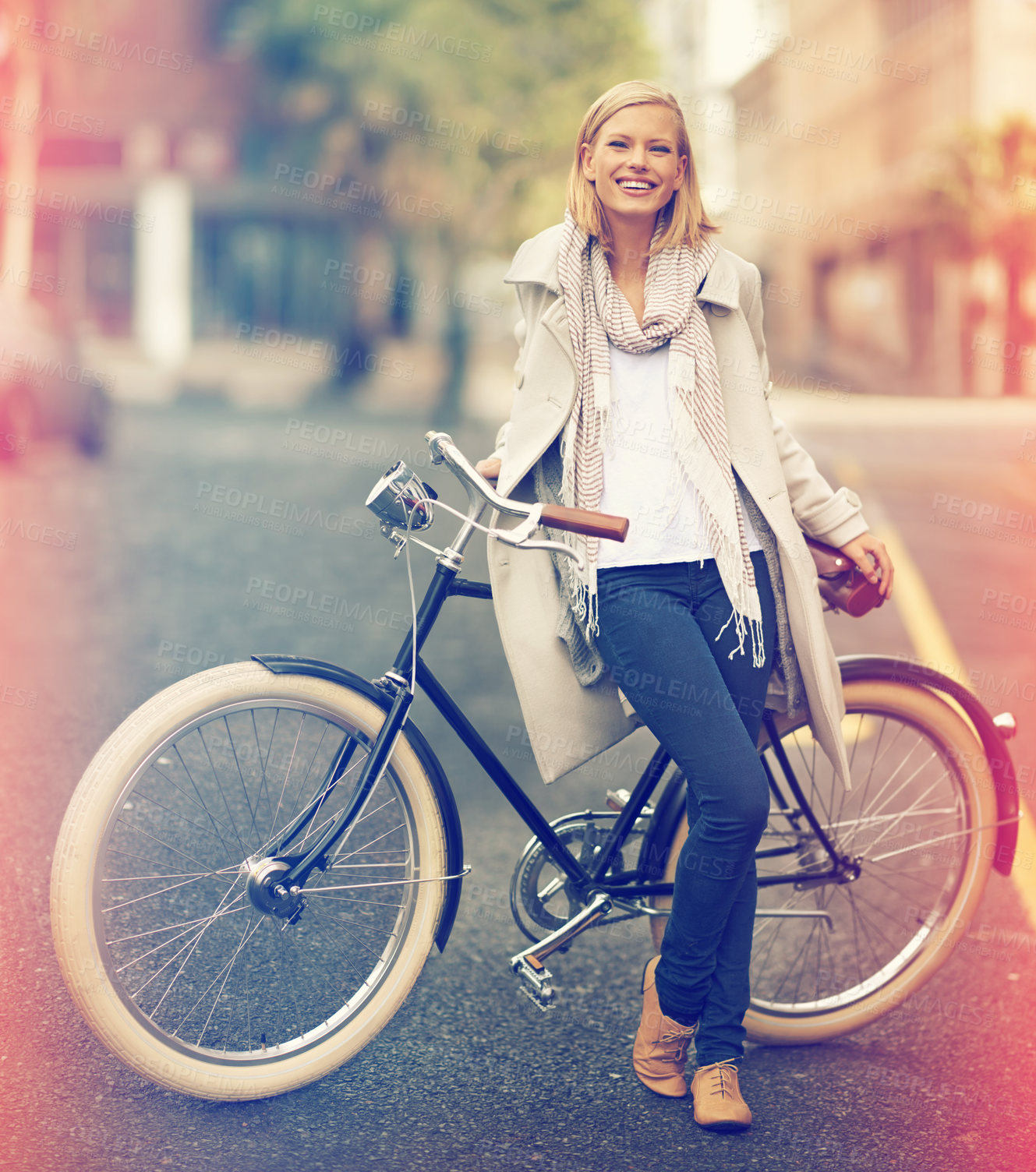 Buy stock photo Woman, portrait and leaning against bicycle in city for eco friendly travel, sustainable and urban area. Lens flare, carbon footprint and environment friendly female person outdoors in Cape Town.