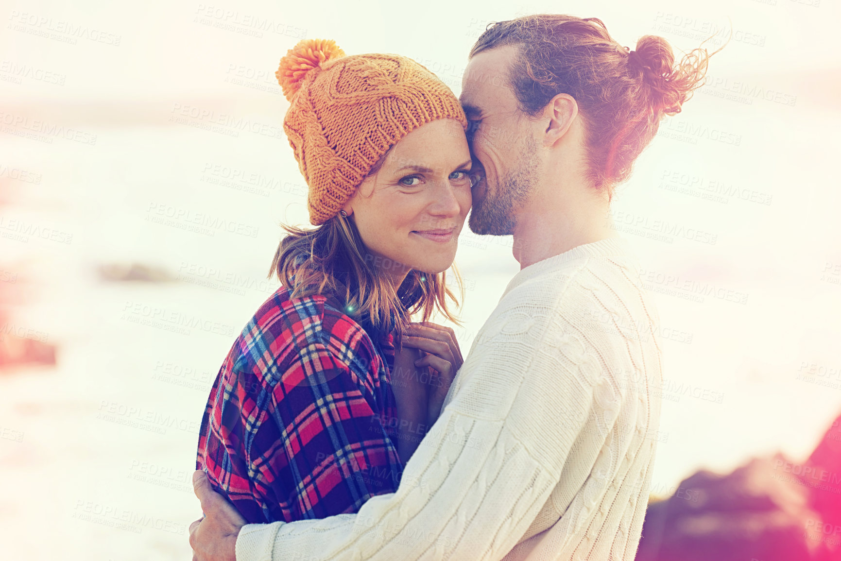 Buy stock photo Beach, smile and portrait of couple hugging with love on vacation, adventure or holiday together. Happy, love and young man and woman embracing with care by ocean or sea on weekend trip in winter.