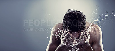 Buy stock photo Man, water and splash face in studio for healthy cleaning or skincare hygiene, treatment or grey background. Male person, hands and washing routine for bathroom self care, wellness or mockup space