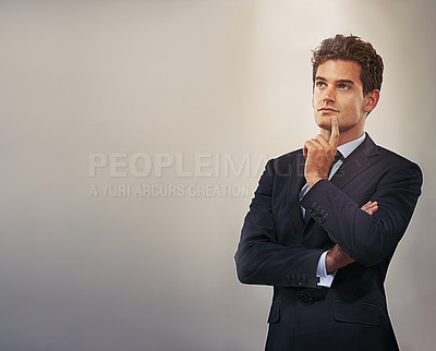 Buy stock photo Businessman, thinking and idea with decision or choice for solution or brainstorming on a gray studio background. Young man, model or employee in wonder, contemplating or thought on mockup space