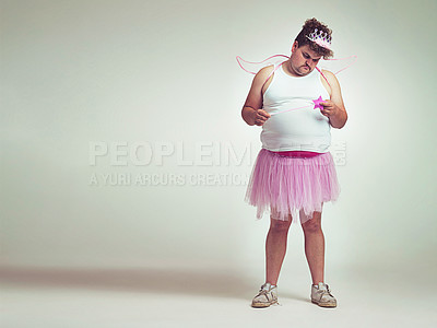 Buy stock photo Funny, costume and man in studio as fairy with magic, wand   wings for plus size cosplay. Pink, character and model in dress up for role play on white background, mockup and space for fantasy