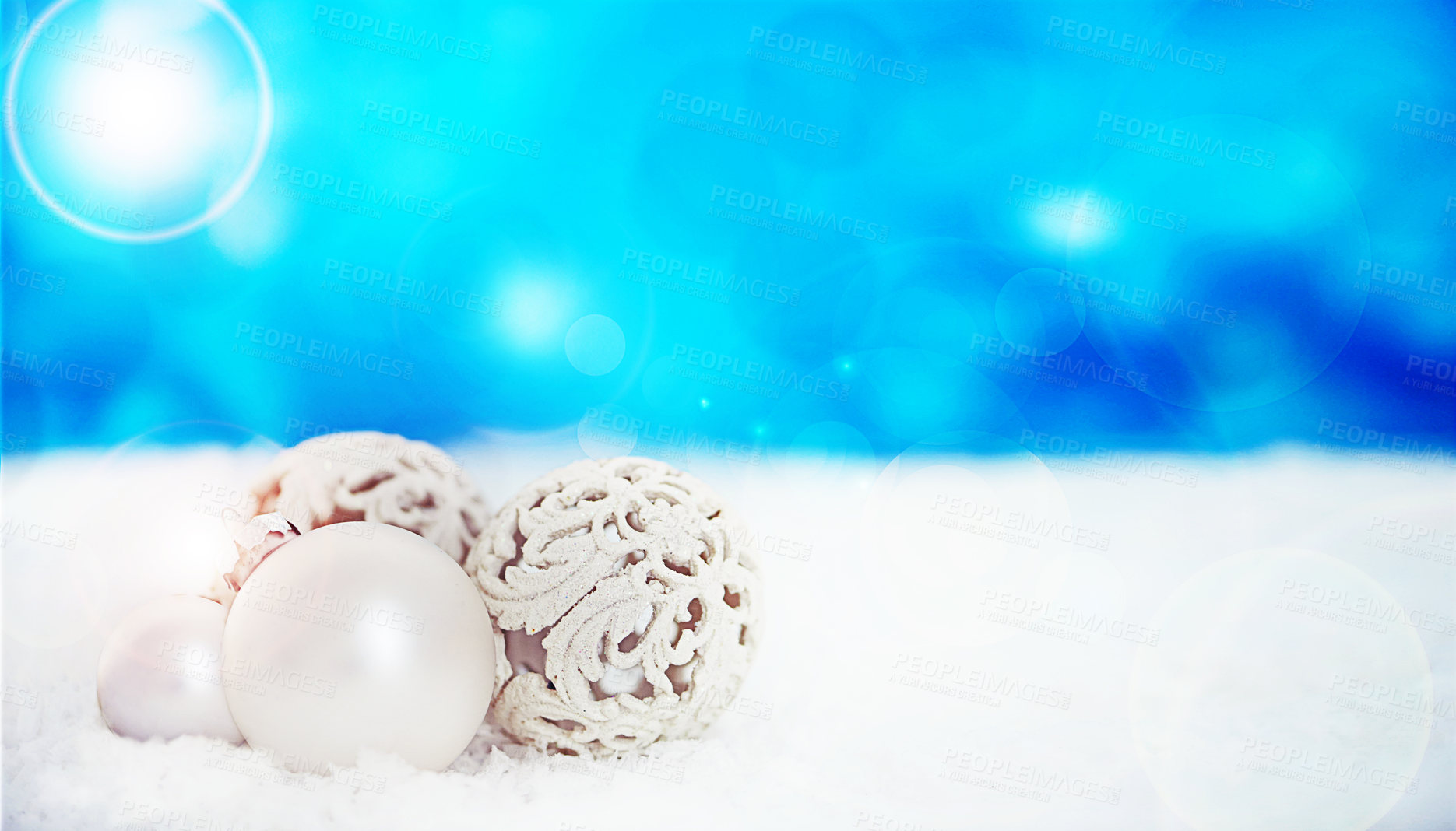 Buy stock photo Ornament, studio and Christmas on snow, festive season and decoration on blue background. Decoration, object and symbol of holiday celebration on mockup space, ball and traditional bauble on backdrop
