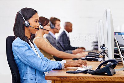 Buy stock photo Call center, woman and consultant with computer for customer service with headset, microphone and typing. Telemarketing, agent and employees with technology for help desk, support and communication