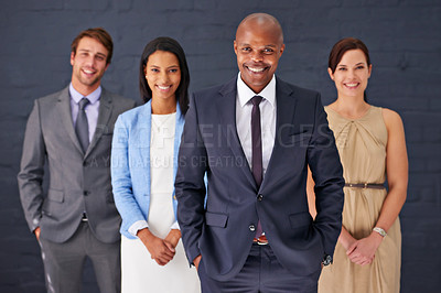 Buy stock photo Business people, portrait and confidence with team standing ready in corporate fashion on a gray studio background. Group of employees with smile in stylish or formal clothing for career ambition