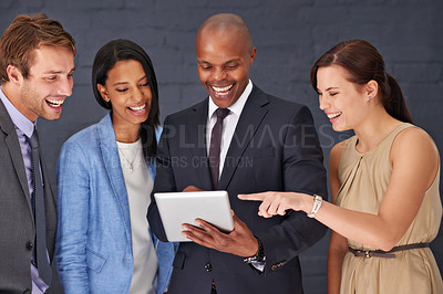 Buy stock photo Business people, group and teamwork with tablet, planning or conversation with funny meme or app. Corporate, diversity or professional with manager or employees with tech, internet or update schedule