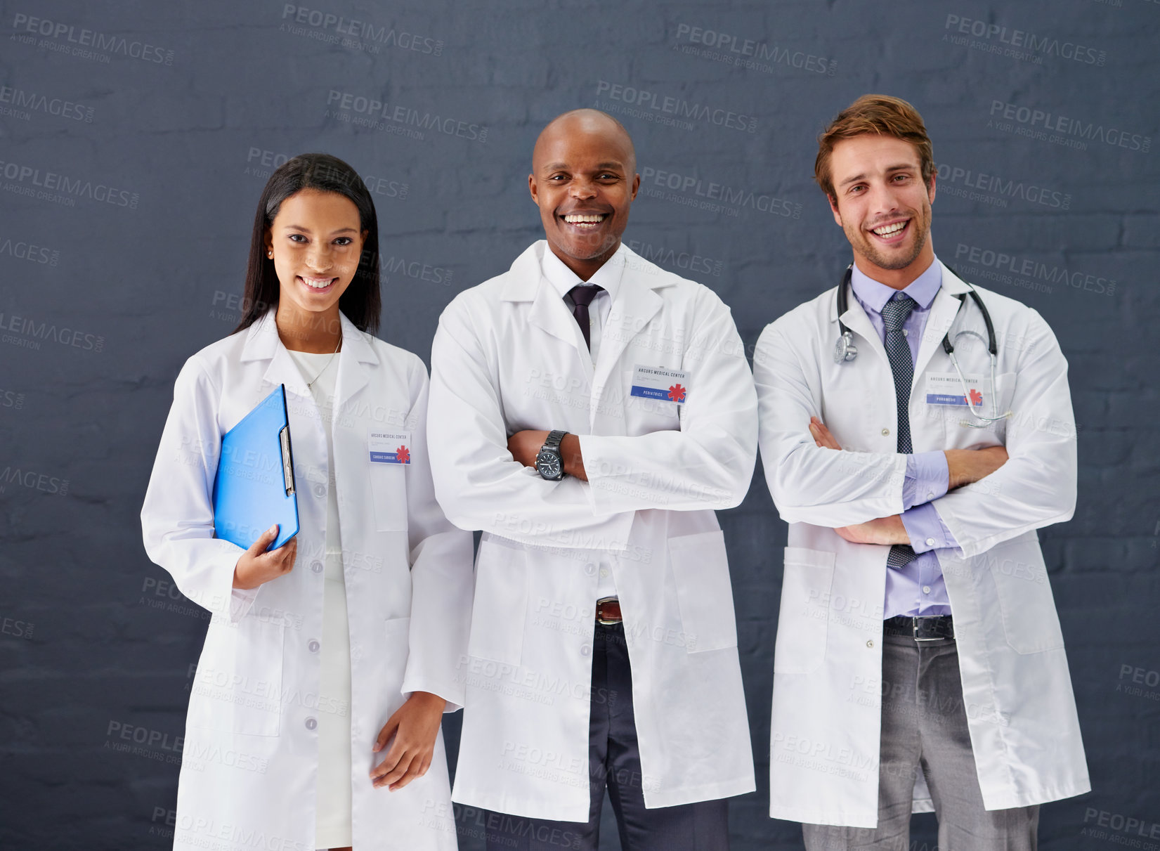 Buy stock photo Doctors, coat and portrait for hospital healthcare service, medical treatment and wellness for professional care. Expert, nurse or specialist team and smile for support, cardiology and medicine  