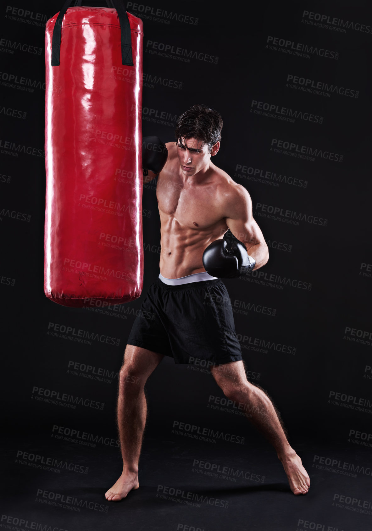 Buy stock photo Man, gloves and boxing bag for fitness practice or cardio workout for health, fighter or black background. Male person, punch and martial arts training in studio on mockup for muscle, gym or fist