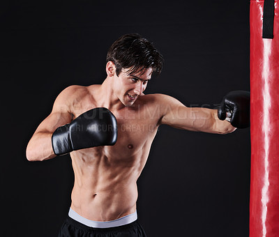 Buy stock photo Man, punching bag and martial arts with fitness, training and fighter with gloves and wellness with cardio. Boxer, practice and athlete with exercise and workout with endurance, health and progress