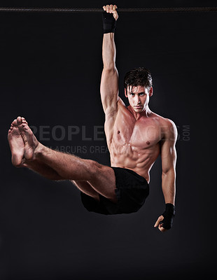 Buy stock photo Man, fitness, and training bar in portrait for sport, workout and bodybuilding on black studio backdrop. Energy, pull up and muscle with male model for exercise hang and mma competition motivation 