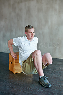 Buy stock photo Gym, thinking and man with disability and workout for mobility and balance training for wellness. Rehabilitation, wellness and physical therapy studio with amputee and physio for health and fitness