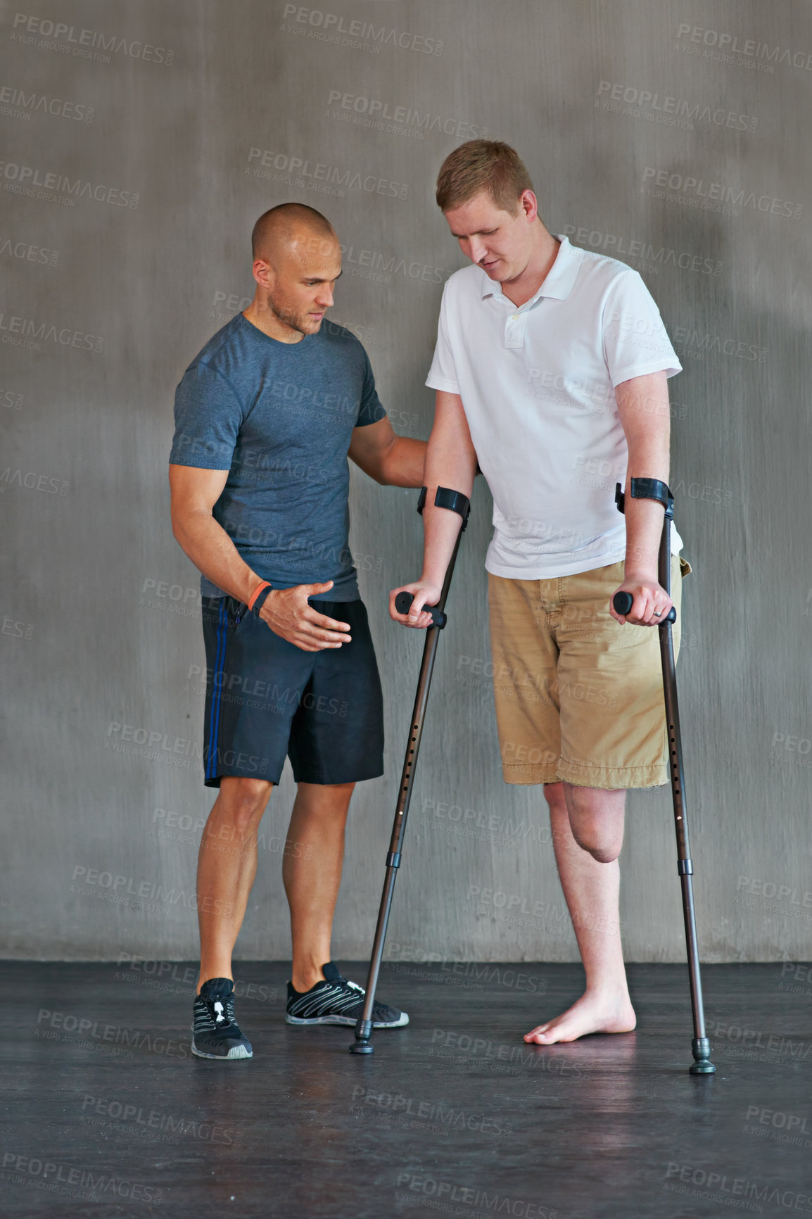 Buy stock photo Physical therapy, crutches and patient with disability to exercise at clinic for recovery, strength and healthcare rehabilitation. Physiotherapist, support and consultation or workout for amputee