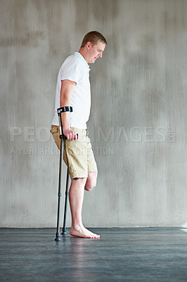 Buy stock photo Physical therapy, person or amputee walking with crutches at clinic for recovery, strength and healthcare rehabilitation. Physiotherapy, support and consultation for patient or man with disability