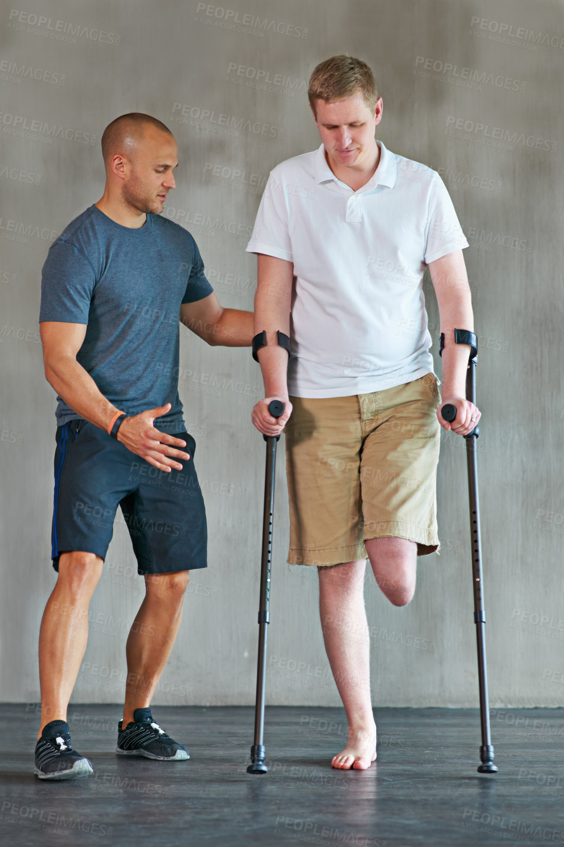 Buy stock photo People, physiotherapy and man with disability for fitness, support and wellness or muscle health in crutches. Physical therapy, physiotherapist and amputee for leg exercise and helping with balance