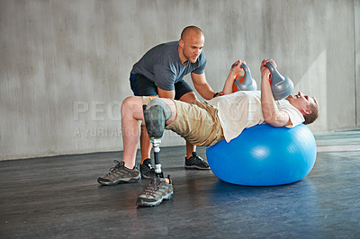 Buy stock photo Physiotherapy, patient or man with disability and kettlebells for exercise at gym for recovery, strength and healthcare rehabilitation. Physiotherapist, help or support and consultation for amputee