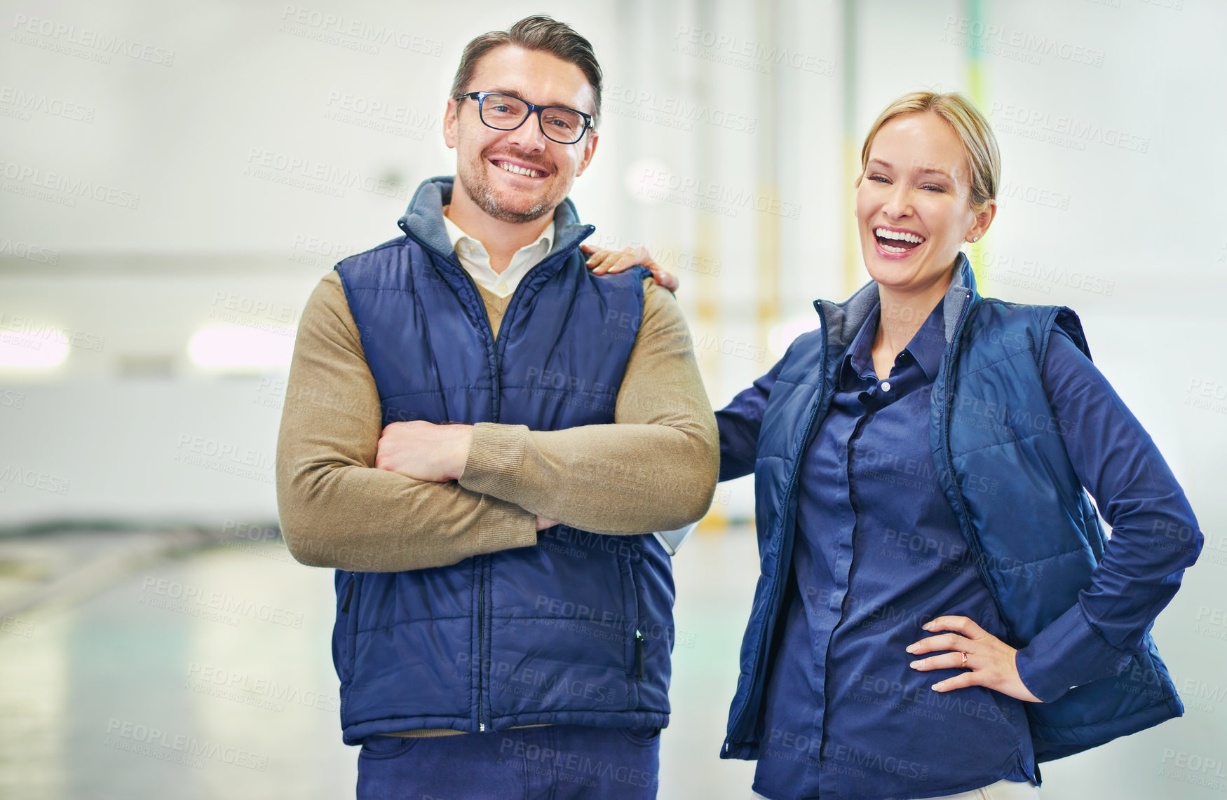 Buy stock photo Portrait of two floor managers working in a large warehouse