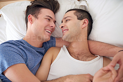 Buy stock photo Men, gay and couple or bed relax in apartment resting with lgbt pride with comfortable love, happiness or connection. Male person, queer and smile with bonding support in home together, calm or peace