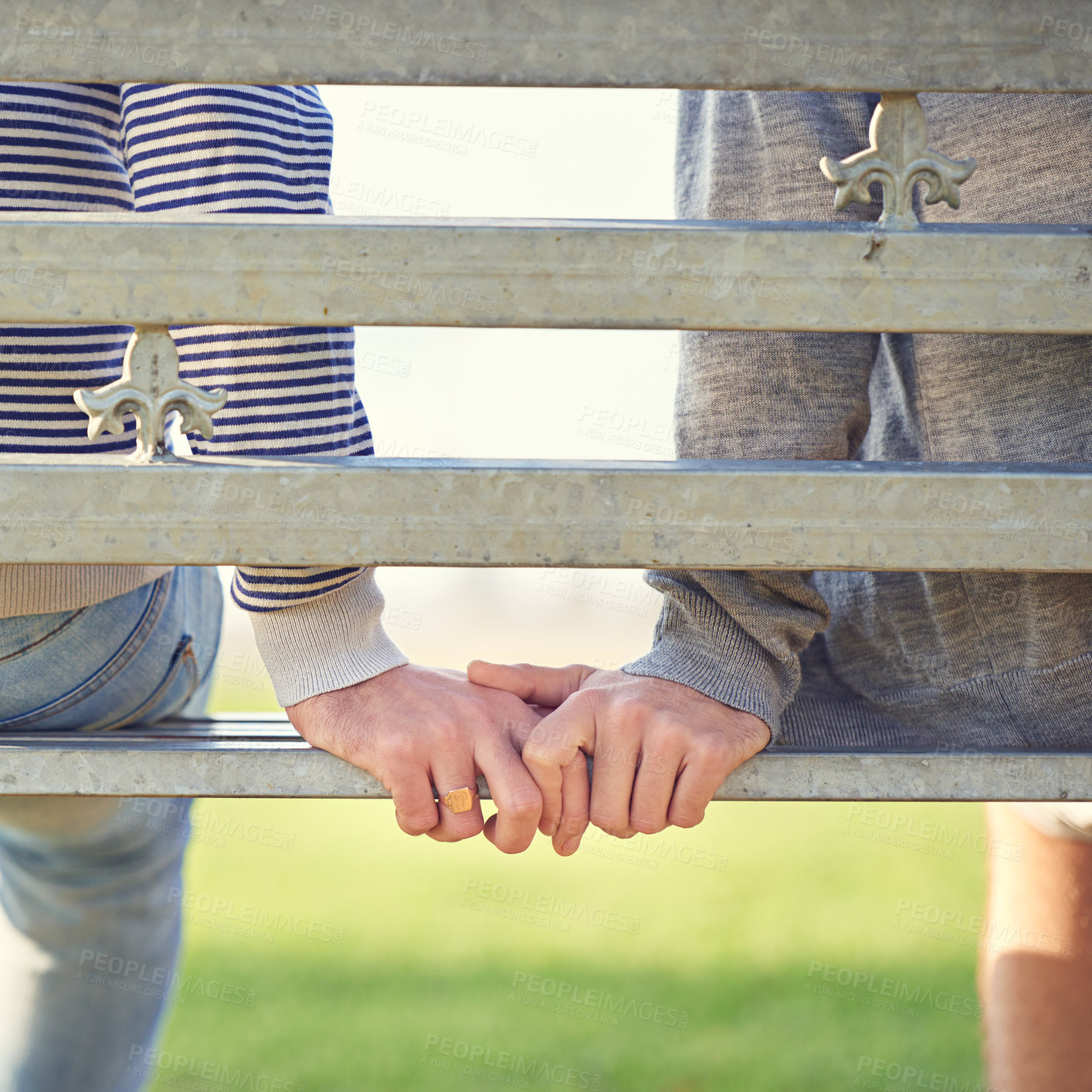 Buy stock photo Love, holding and hands for couple people, closeup and marriage on bench in park. Affection, hold and support or trust from partner in nature, relationship and partnership on holiday or honeymoon 