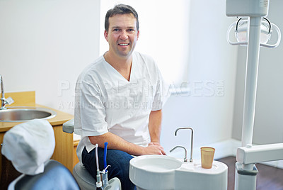 Buy stock photo Man, portrait and dentist for teeth health or wellness at basin for cleaning hygiene, whitening or equipment. Male person, face and employee for mouth insurance or gum clinic, smiling or dental care