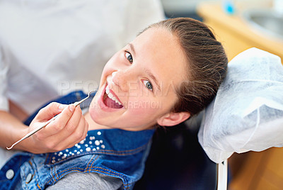 Buy stock photo Girl, child and portrait at dentist for dental with healthcare tool, consultation or mouth inspection for oral health. Professional, kid patient or hand for teeth cleaning, gingivitis or medical care