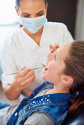 Buy stock photo Professional woman, girl and dentist with tools in hands for teeth check, hygiene and healthcare. Young patient, female orthodontist and cleaning for mouth with braces, tooth decay and gum health