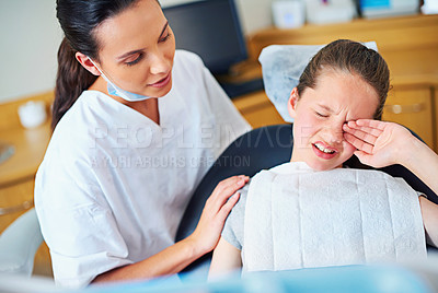 Buy stock photo Fear, dental or crying girl with dentist in toothache consultation, problem or crisis. Pediatric dentistry, comfort or kid with stress, anxiety or tears for root canal, crown or extraction phobia 