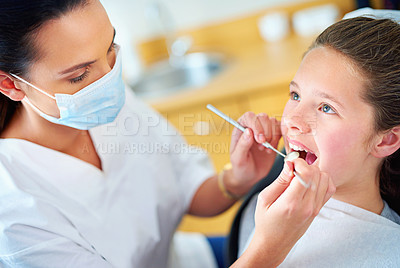 Buy stock photo Woman, dentist and child for teeth consultation or appointment for dental cavity, whitening or examination. Female person, face mask and oral hygiene with tools for gum diagnosis, equipment or tooth