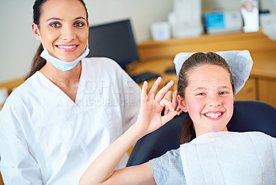 Buy stock photo Thumbs up, happy and portrait of dentist with child for cleaning, teeth whitening and wellness. Healthcare, dentistry and woman and girl with emoji for dental hygiene, oral care and medical services