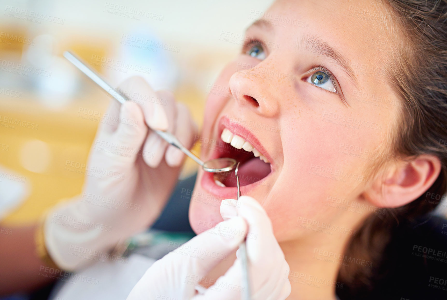Buy stock photo Girl, child and mouth inspection at dentist with healthcare tool, consultation or dental mirror for oral health. Professional, kid patient or glove hand for teeth cleaning, gingivitis or medical care