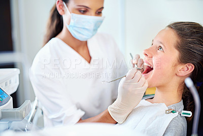 Buy stock photo Girl, child and dental inspection at dentist with healthcare tool, consultation and safety mask for oral health. Professional, kid patient or glove hand for teeth cleaning, gingivitis or medical care