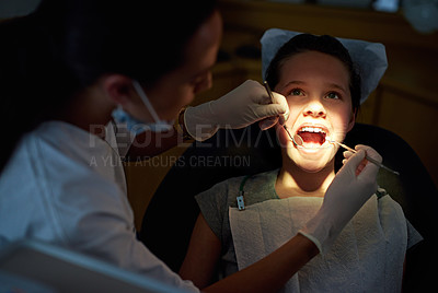 Buy stock photo Dental, mirror or girl with dentist for mouth exam, tooth cavity or gum disease, bacteria or search. Oral care, wellness or doctor with light, equipment or tool for pediatric dentistry or cleaning