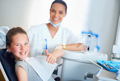 Buy stock photo Thumbs up, dentist and portrait of child in chair for cleaning, teeth whitening and wellness. Healthcare, dentistry and woman and girl with emoji for dental hygiene, oral care and medical services