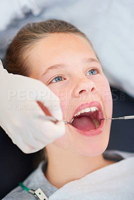 Buy stock photo Girl, child and mouth inspection at dentist for healthcare with dental tool, consultation or checkup for oral health. Expert, kid patient and glove hand for teeth cleaning, gingivitis or medical care
