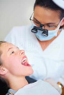 Buy stock photo Dentist, consultation and woman with girl, kid and checkup for teeth whitening and oral healthcare. Professional, child and patient with medical procedure and appointment with dental hygiene or trust