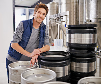 Buy stock photo Brewery, man and portrait with tank in factory with confidence, pride and container machine for manufacturing. Industrial, worker and smile in distillery by metal equipment for brewing in warehouse