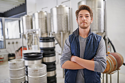 Buy stock photo Brewery, man and portrait with arms crossed in factory with confidence, pride and container machine for manufacturing. Industrial, worker and smile in distillery with tank for brewing in warehouse