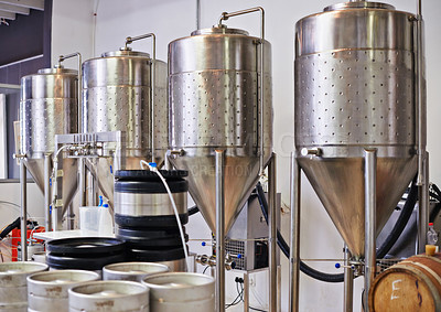 Buy stock photo Shot of steel tanks in a brewery